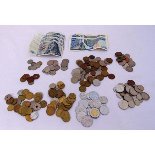 277 - A quantity of foreign coins to include European, African and Asian currency including Iran 200 Rial ... 