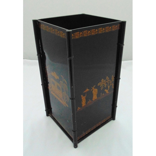 32 - A black lacquered rectangular umbrella and stick stand in the Chinoiserie style with simulated bambo... 