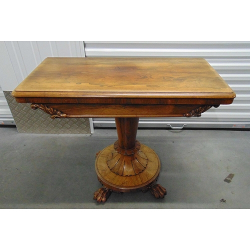 7 - A late 19th century games table on circular base with four ball and claw feet, 74.5 x 91.5 x 45cm cl... 