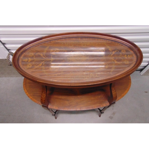 5 - A mahogany shaped oval tea table with detachable tray on turned cylindrical supports, 83 x 80.5 x 46... 