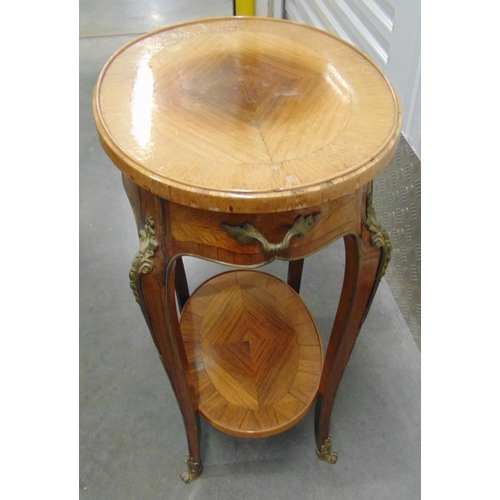 6 - A French early 20th century shaped oval side table with gilt mounts on four scroll legs, 73 x 51 x 3... 