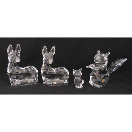 130 - A quantity of Daum glass figurines to include two deer, a squirrel and a cat, all signed to the base... 