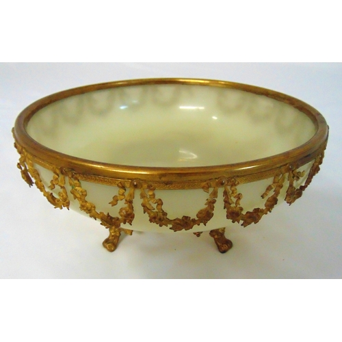 135 - A French gilt metal and  glass fruit bowl on four vine chased scroll feet, 11 x 24cm, A/F