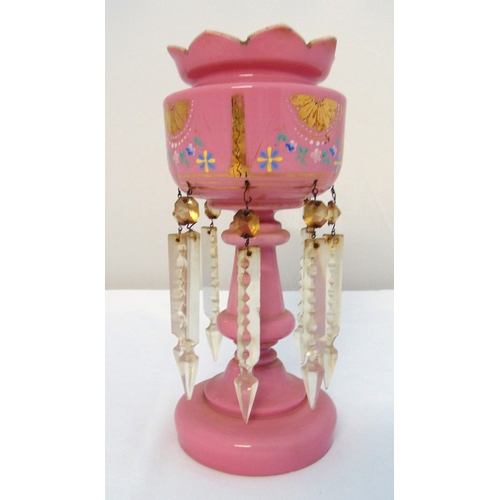 137 - A Victorian pink glass lustre of customary form with crystal drops, 32cm (h)
