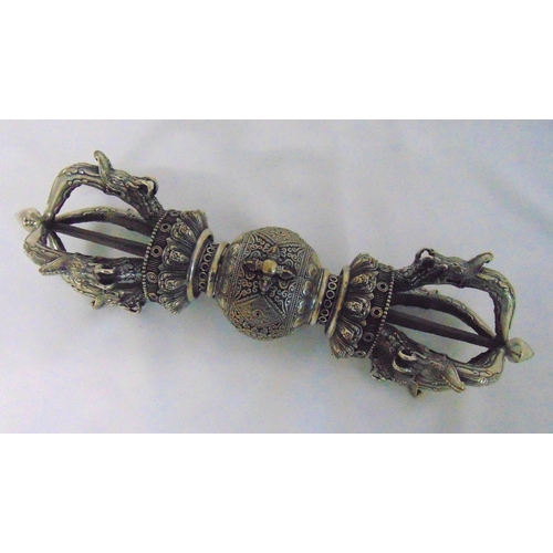 157 - A Tibetan white metal Vajra of customary form, 38 x 9cm