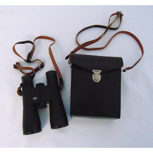 165 - A pair of Leitz binoculars in fitted leather case, 7x 42b 140m/1000m Trinovid 806754