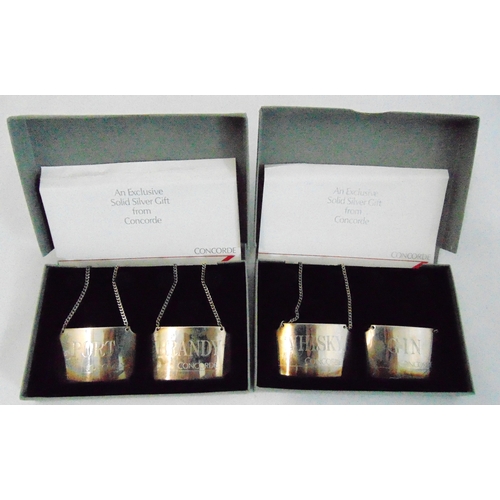171 - Four hallmarked silver Concorde presentation bottle labels with suspensory chains in original packag... 