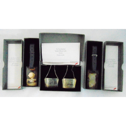 172 - Two hallmarked silver Concorde presentation bottle labels with suspensory chains in original packagi... 