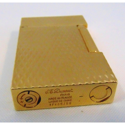 176 - S T Dupont gold plated cigarette lighter in original packaging