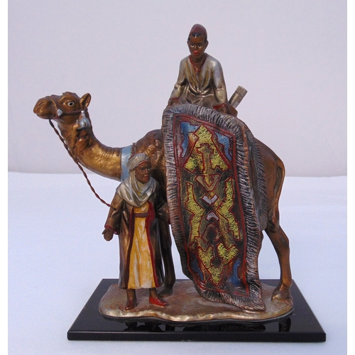 178 - A 1920s Bergman style cigar lamp in the form of a cold painted bronze of an Arab rug seller mounted ... 