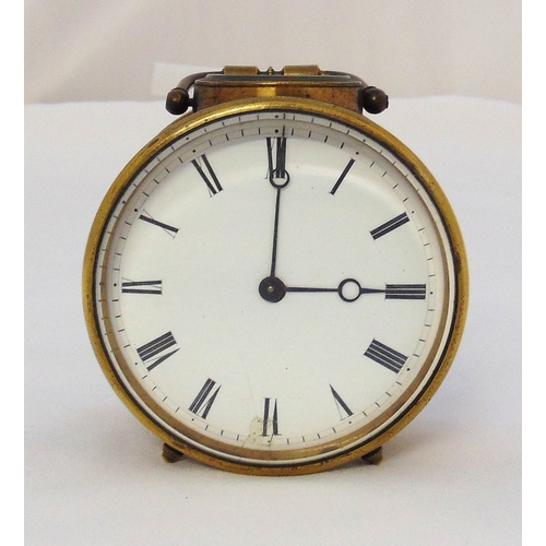243 - An early 20th century brass clock, drum form, the white enamel dial with Roman numerals and swing ha... 