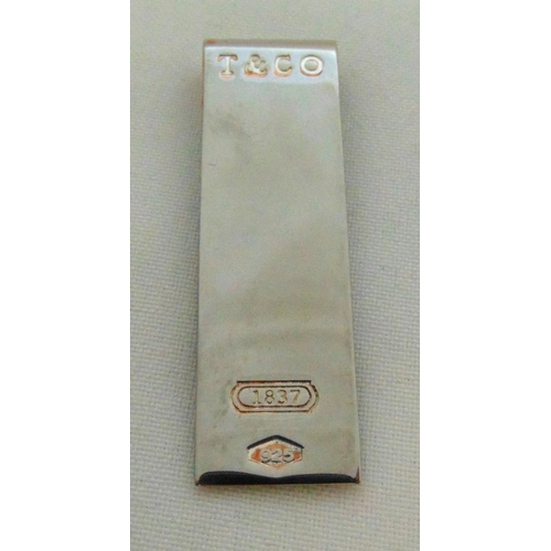 262 - Tiffany and Co. sterling silver money clip of plain rectangular form, approx total weight 16.1g