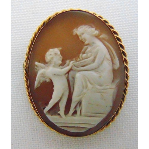 264 - 9ct gold Cameo brooch carved with classical figures within rope twist frame