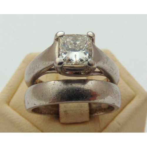 275 - Platinum diamond solitaire engagement ring to include GIA certificate and a matching wedding band, d... 
