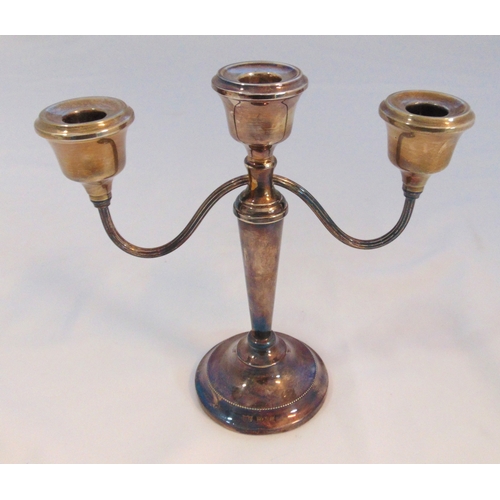 301 - A hallmarked silver three light candelabrum, reeded scrolling arms on raised circular base with bead... 