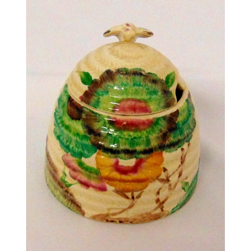 108 - Clarice Cliff Bizarre honey pot and cover, marks to the base, 9.5cm (h)
