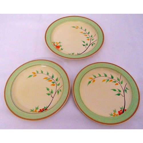 112 - Three Clarice Cliff plates decorated with flowers and leaves, 21.5cm (d)