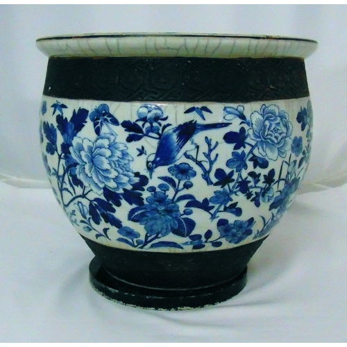 116 - Chinese ceramic fish bowl the sides decorated in blue on white with birds and peonies, with black ma... 