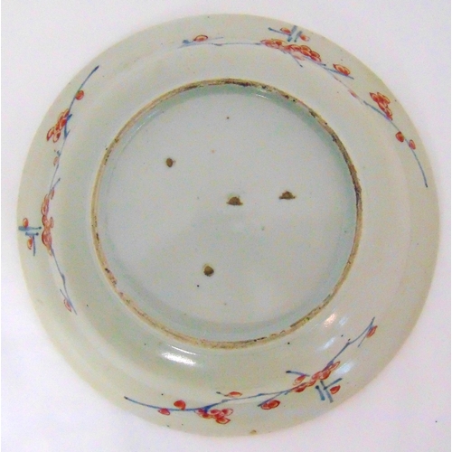 119 - A Chinese 19th century bowl decorated with flowers and leaves, 23.5cmm (d)