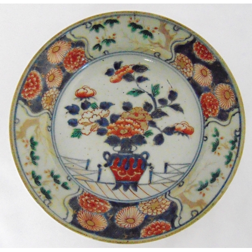 119 - A Chinese 19th century bowl decorated with flowers and leaves, 23.5cmm (d)