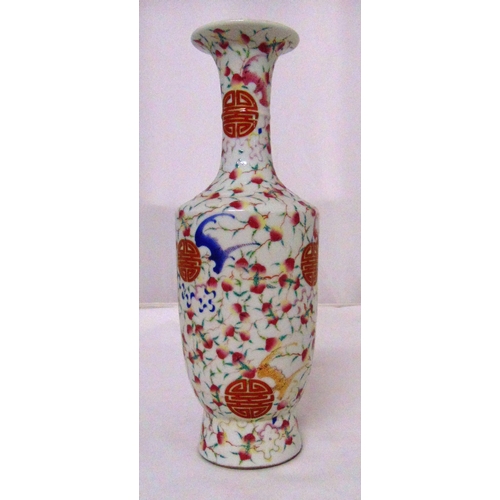 122 - A Chinese polychromatic stem vase decorated with bats and symbols, marks to the base, 31cm (h)