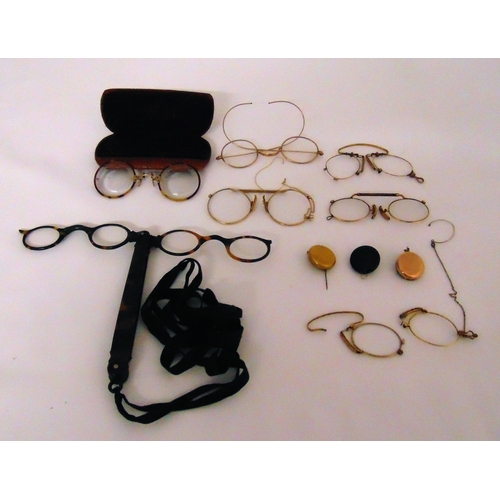 194 - Six pairs of gold framed pince-nez spectacles together with three retractable brooch spectacle chain... 