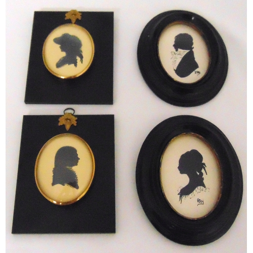 199 - Four framed monochromatic silhouettes of ladies and gentlemen, two signed Ray, 8.5 x 6cm