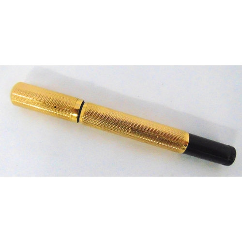 362 - 18ct yellow gold engine turned fountain pen with retractable gold nib, A/F