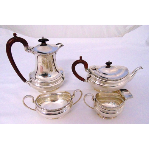 382 - A hallmarked silver four piece tea and coffee set oval form with Celtic borders, Birmingham 1936, ap... 