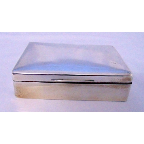 398 - Goldsmiths and Silversmith Company hallmarked silver rectangular plain cigarette box with cedar wood... 
