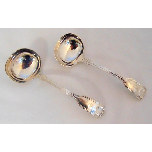 428 - A pair of hallmarked silver sauce ladles fiddle and shell pattern, Sheffield 1938, approx total weig... 