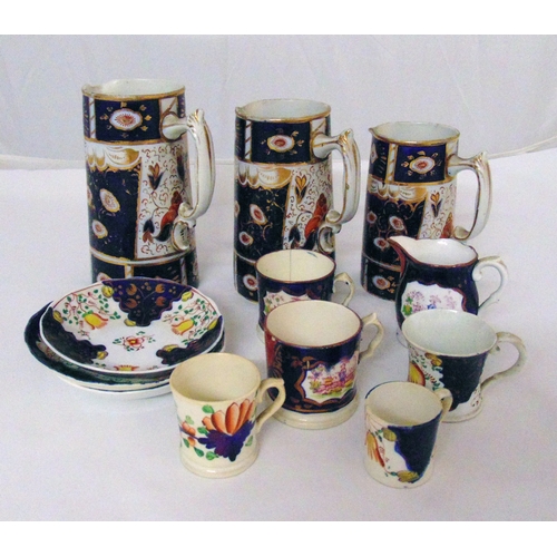 96 - Three graduated early 19th century Staffordshire Ironstone cobalt blue and gold pitchers, tallest 20... 