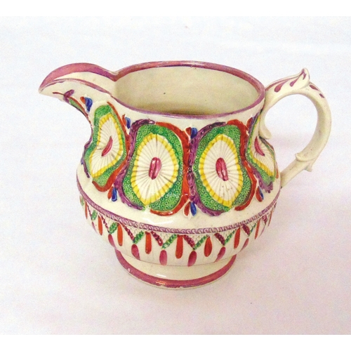 119 - A Victorian Sunderland ware jug, decorated with polychromatic roundels and swags and leaf capped dou... 