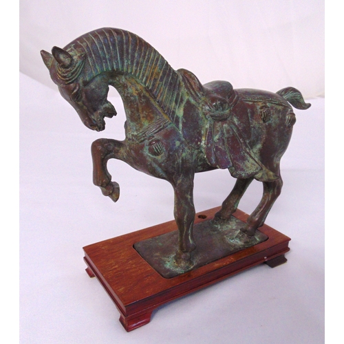 155 - An oriental bronze figurine of a Tang Horse on raised rectangular wooden plinth, 24 x 27 x 10.5cm, h... 