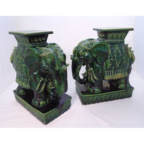 156 - A pair of oriental ceramic garden seats in the form of elephants on raised rectangular bases, each 5... 