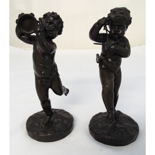 170 - A pair of 19th century bronze cupids, one with tambourine the other with triangle, both on circular ... 