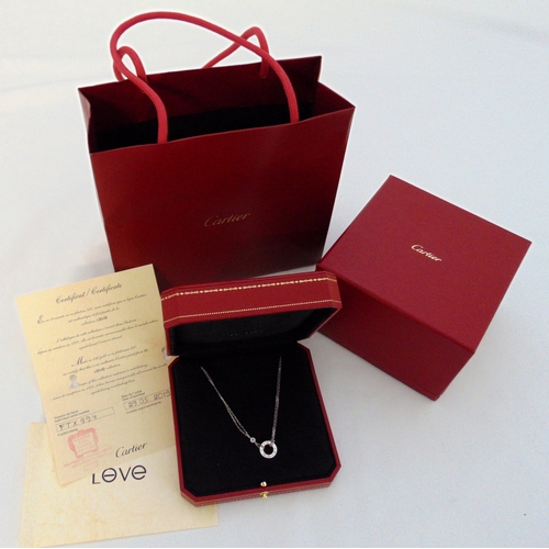 278 - Cartier 18ct white gold love pendant with two diamonds on a double strand chain, to include box and ... 