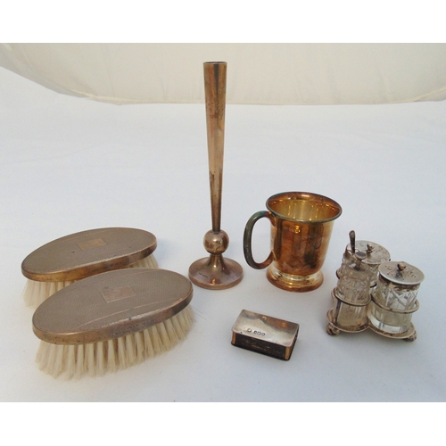 332 - A quantity of hallmarked silver to include a cup, a vase, a condiment set, a matchbox holder and a p... 