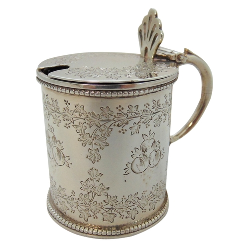 246 - Victorian hallmarked silver drum shaped mustard pot engraved with flowers, fruits and leaves, double... 