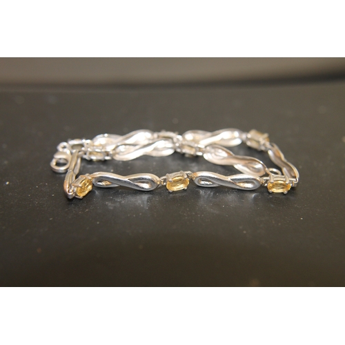 170 - 925 silver bracelet with yellow stones size 7''