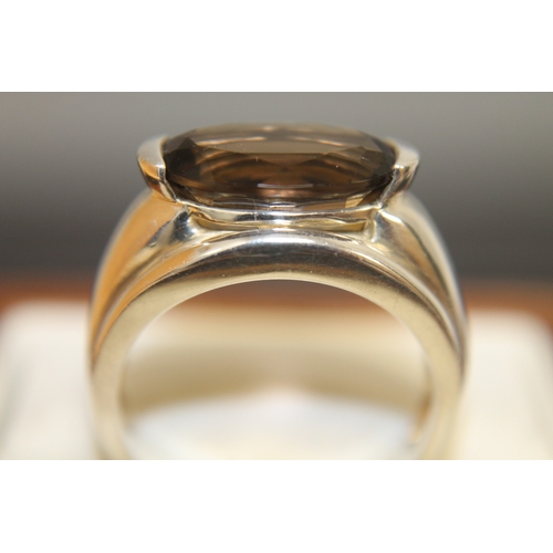 173 - 925 silver ring with oval smoky quartz ring size U