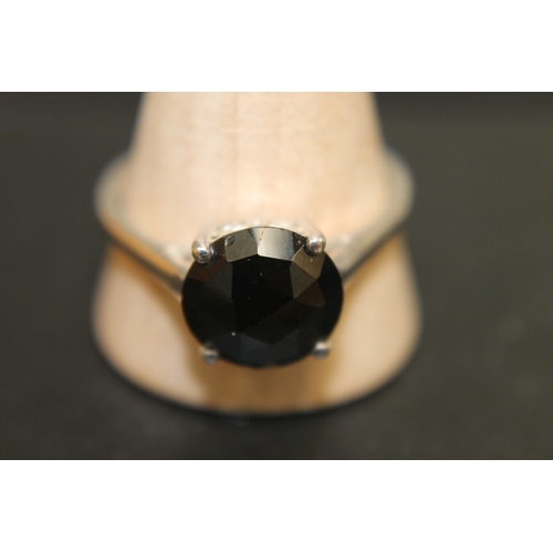 194 - 925 silver and black stone ring size V