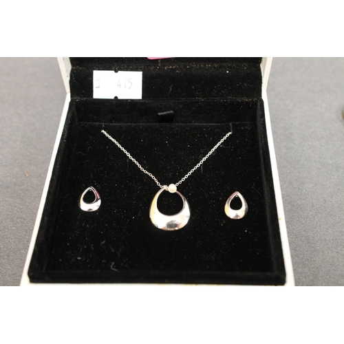 219 - 925 silver necklace with pendant and matching earrings boxed