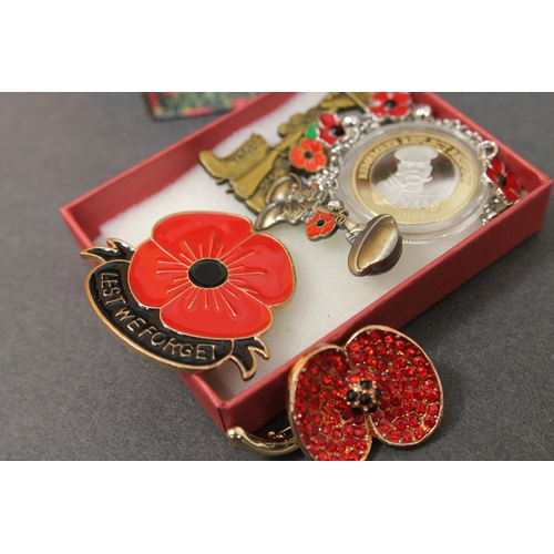 226 - Job lot of poppy remembrance day brooches,pins and coin in box