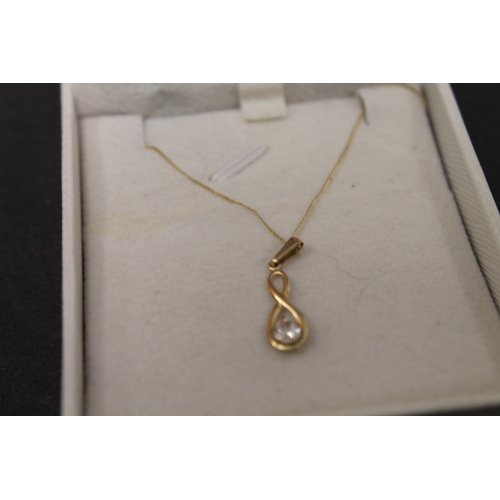 250 - 9ct gold chain with yellow metal pendant boxed chain weighs 0.12gms