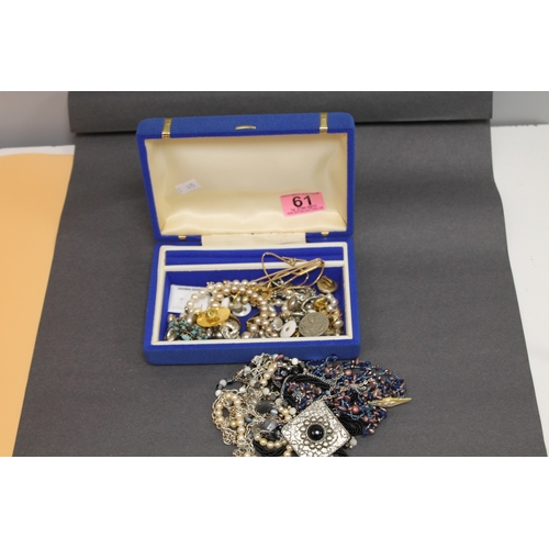 61 - Blue & Gold Jewellery box with a job lot of costume jewellery