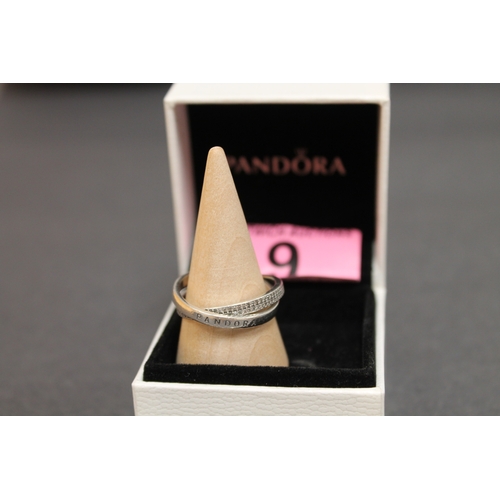 9 - Pandora silver size 58 cross over boxed ring with diamante' stones