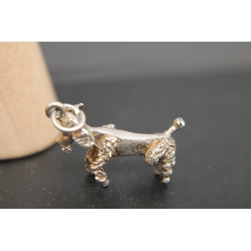 90 - White metal sitting poodle dog pendant