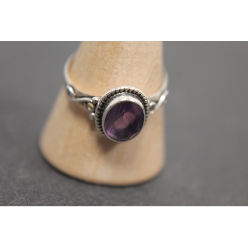 303 - 925 silver Amethyst stone ring size Q