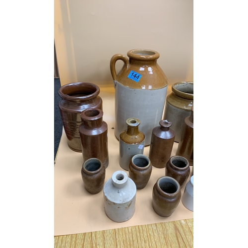 144 - Job lot of stoneware, flagons and jars